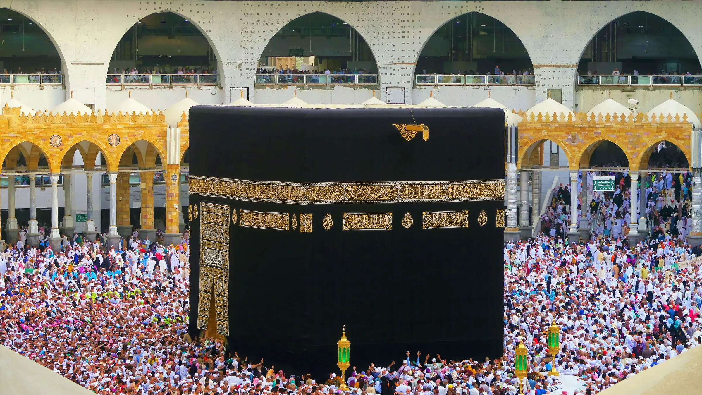 Pilgrims performing tawaf around the Kaaba in daylight